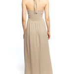 Maxi halter dress with cinched front, tie neck, under bust/side cutouts, smocked back and pockets in mocha