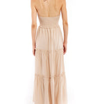 tiered maxi dress with mock neck, tie back halter, smocked bodice and back and ruffled detailing along the tiers in clay
