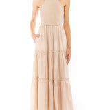 tiered maxi dress with mock neck, tie back halter, smocked bodice and back and ruffled detailing along the tiers in clay