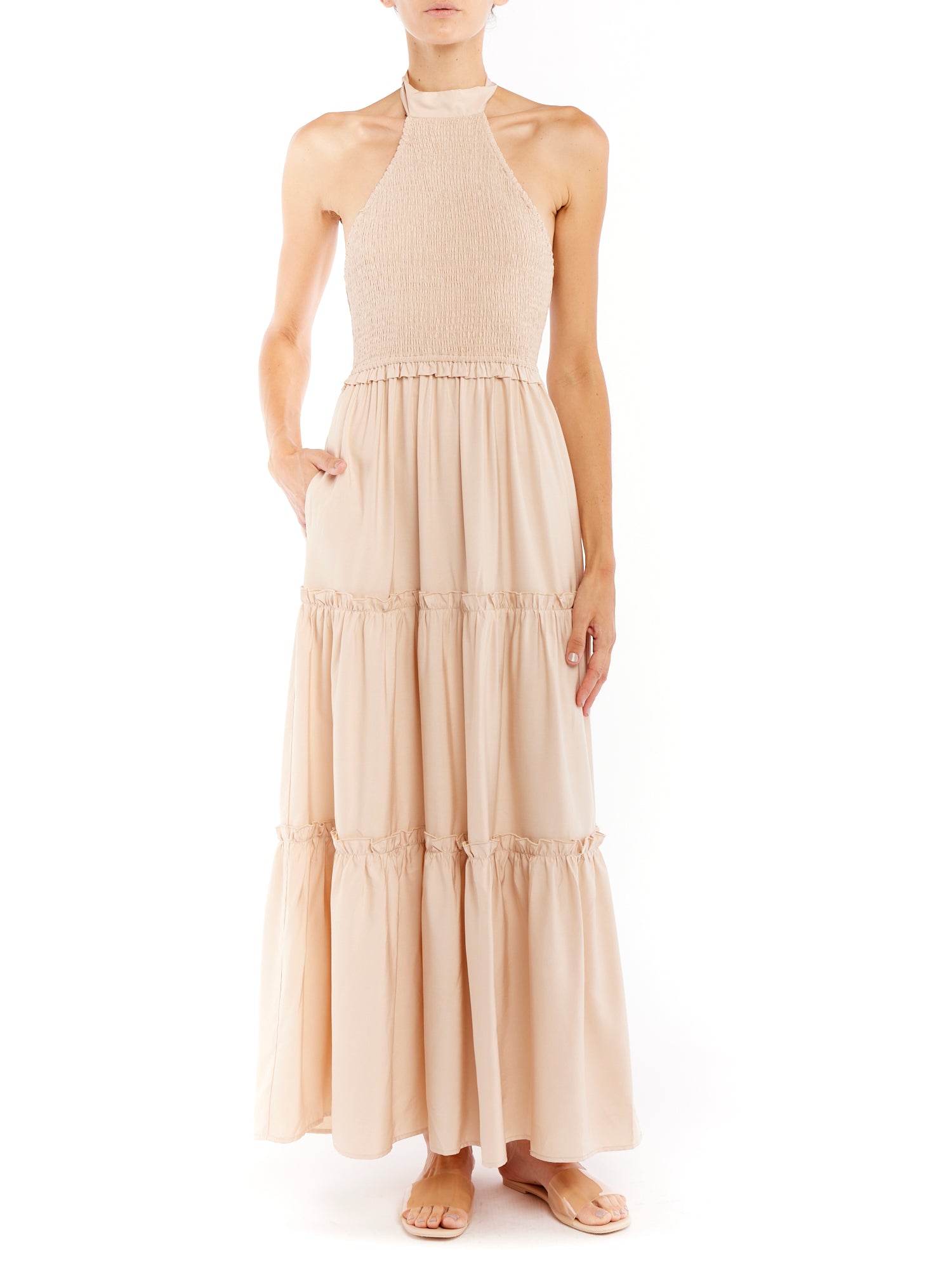 tiered maxi dress with mock neck, tie back halter, smocked bodice and back and ruffled detailing along the tiers in clay