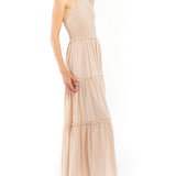 tiered maxi dress with mock neck, tie back halter, smocked bodice and back and ruffled detailing along the tiers in clay