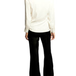 collared, side tie blouse featuring long sleeves with button cuffs in ivory