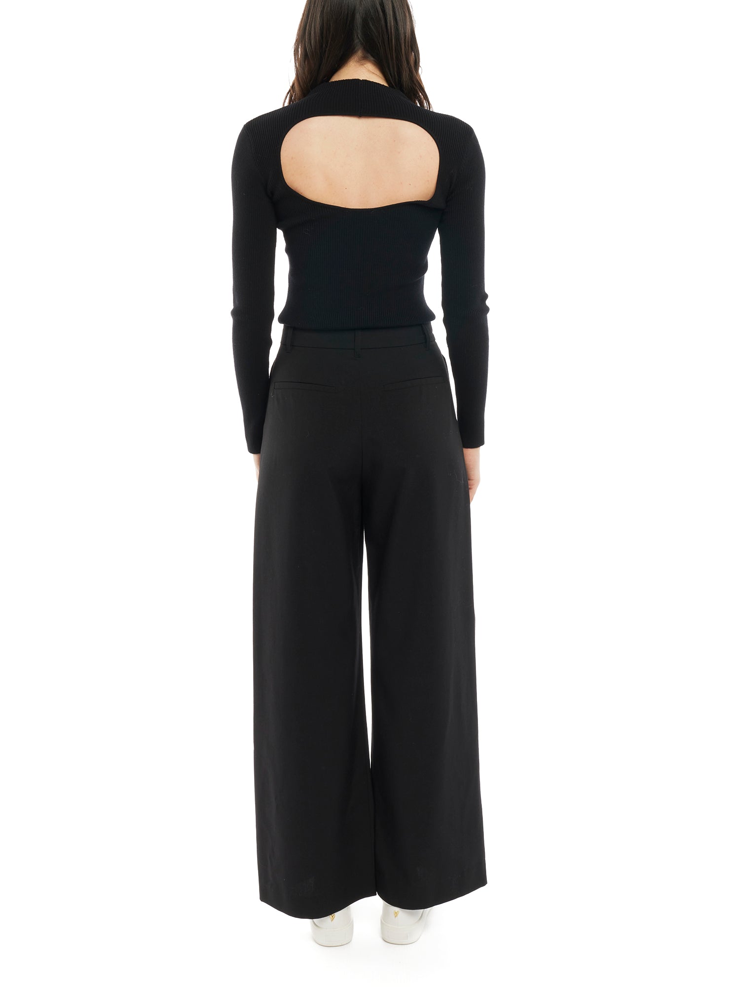 mid-rise, wide leg trousers with a zipper and button closure, side and back pockets - back view