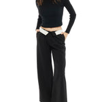 mid-rise, wide leg trousers with a zipper and button closure, side and back pockets - fold over