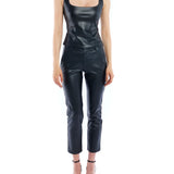 faux leather trouser with a medium rise, belt loops, slightly cropped cut and side pockets in black