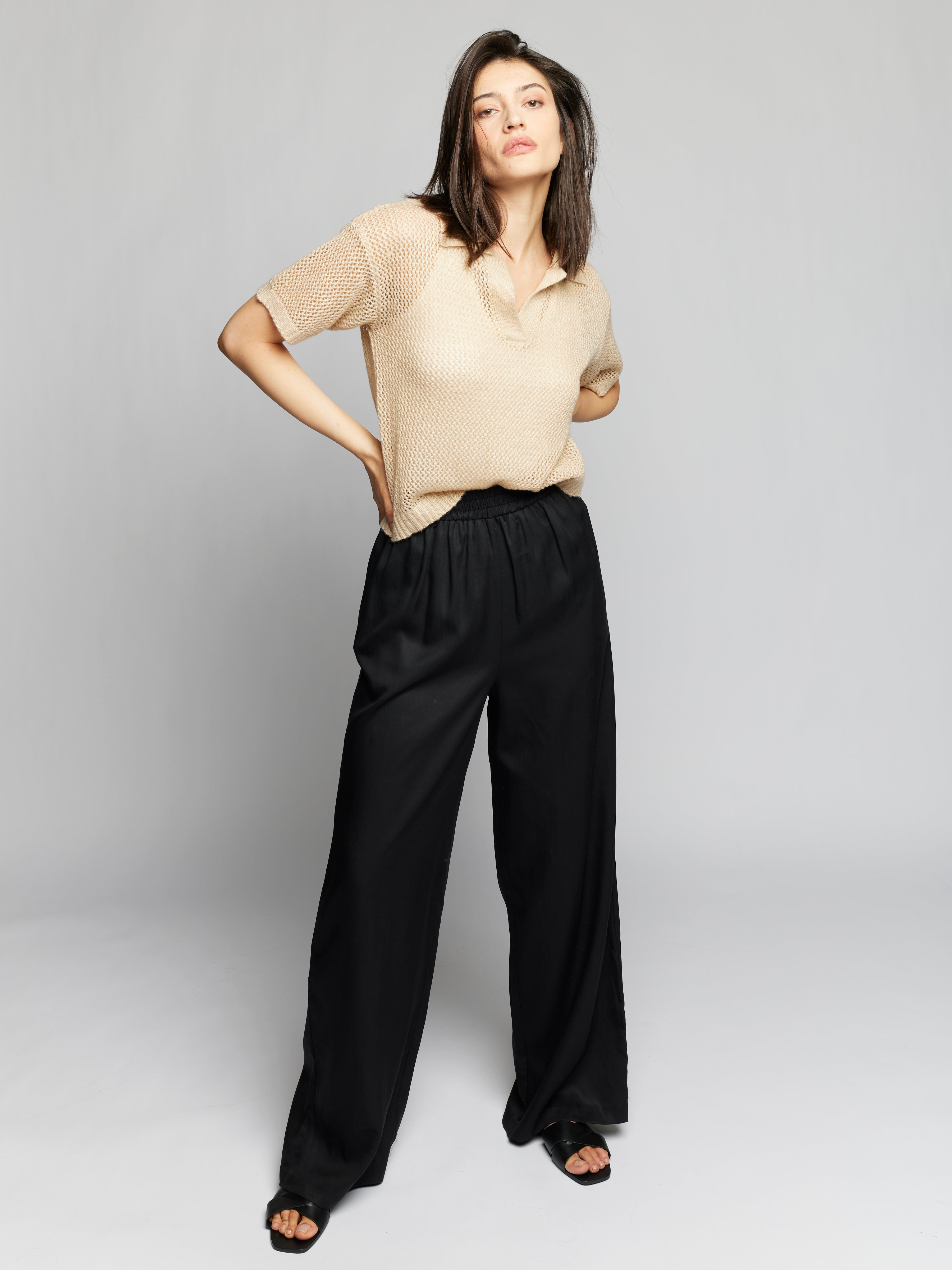 mid-rise wide leg pants with an elasticized waist and easy, relaxed fit in black