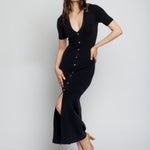 short sleeve, button down midi dress with a deep V-neck and figure hugging fit in black