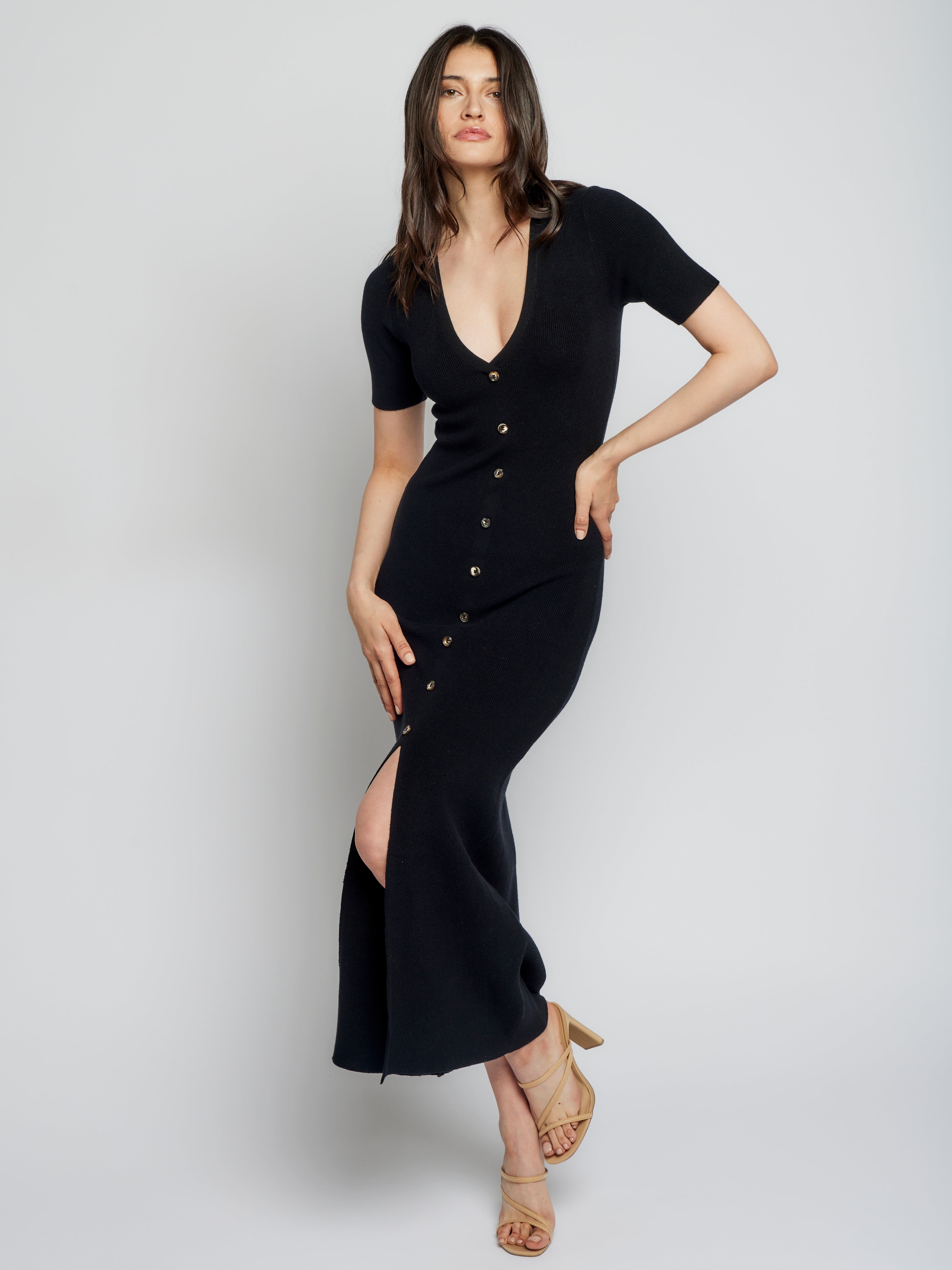 short sleeve, button down midi dress with a deep V-neck and figure hugging fit in black