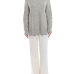 vegan knit, turtleneck sweater featuring long sleeves, a relaxed fit, small side slits and a drop shoulder seam in grey