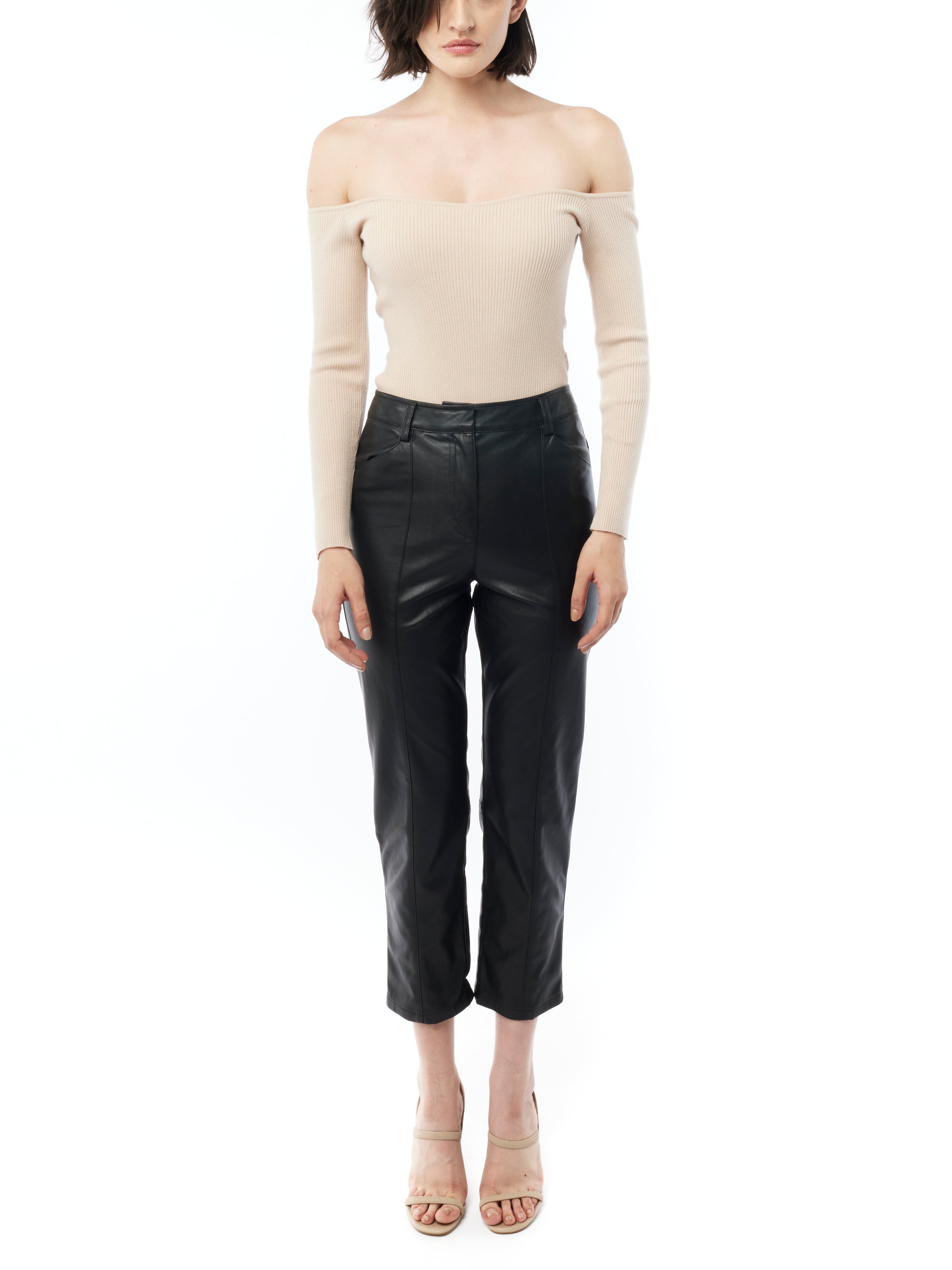 faux leather pants with a mid rise, cropped length and pockets in black