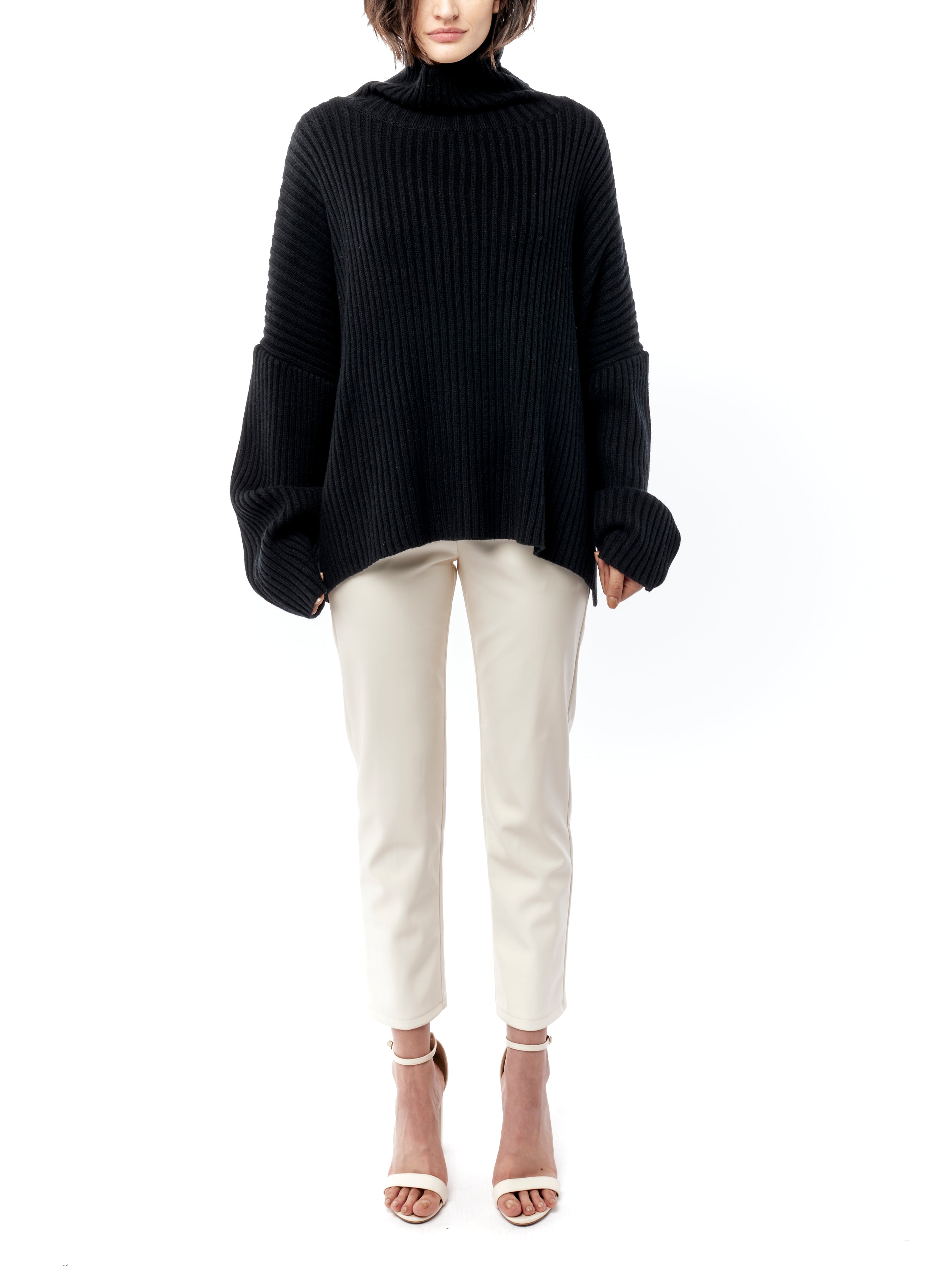 cozy, oversized sweater with ribbed detailing and comfy turtleneck in black