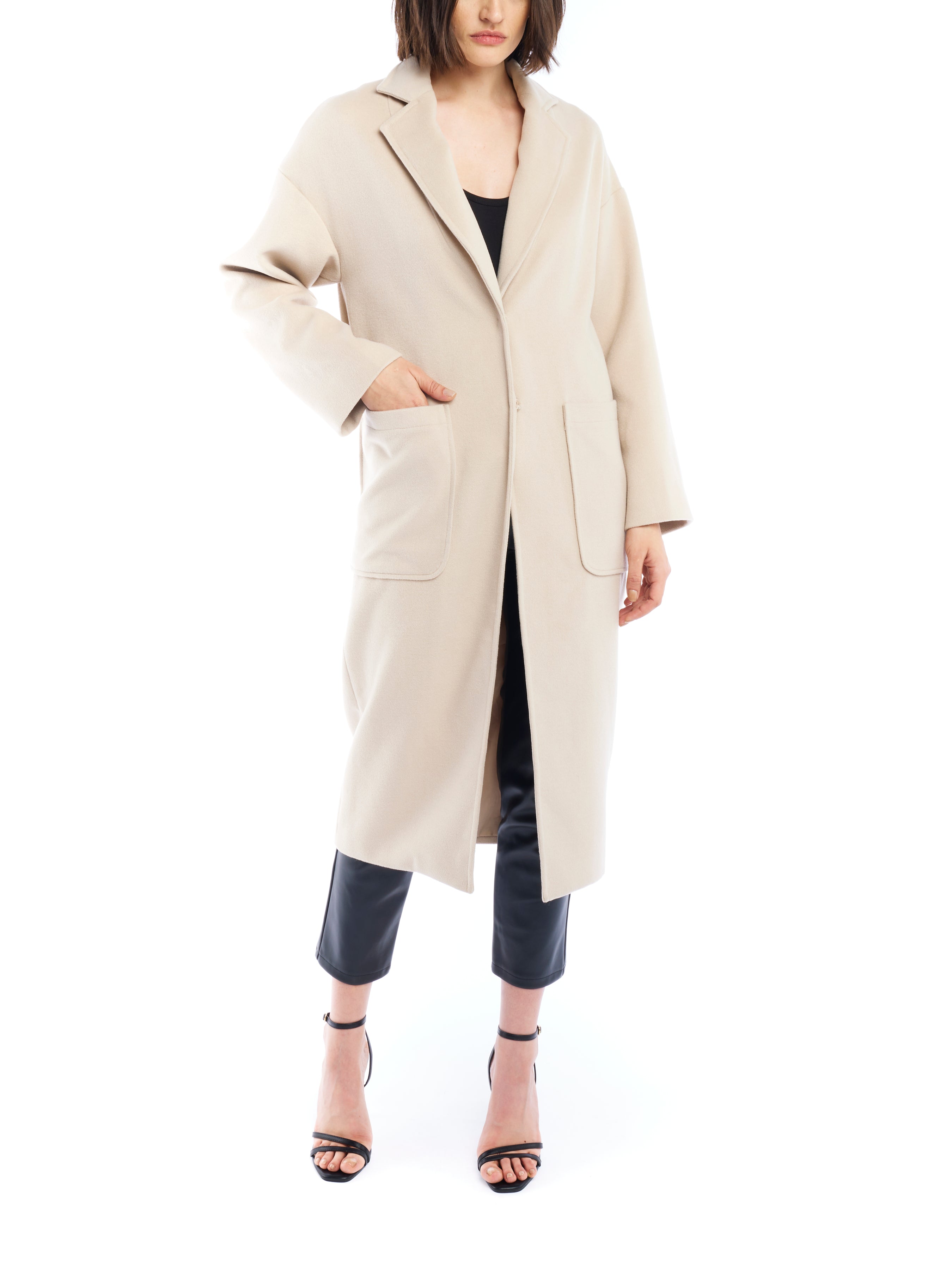 Clifton midi length jacket featuring hidden snap closure and large front pockets in taupe - front