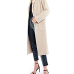 Clifton midi length jacket featuring hidden snap closure and large front pockets in taupe - side