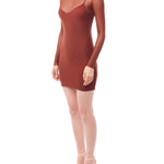 figure hugging, long sleeve mini dress with a sheer mock neck, sheer long sleeves with a spaghetti strap slip lining in rust