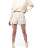 Faux leather, high-waisted short with a gathered elasticized back, pleated front and pockets in ivory