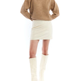 faux leather mini skirt in ivory - front view