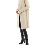 Chic turtleneck, cruelty-free knit sweater with long sleeves and slit front - side shot