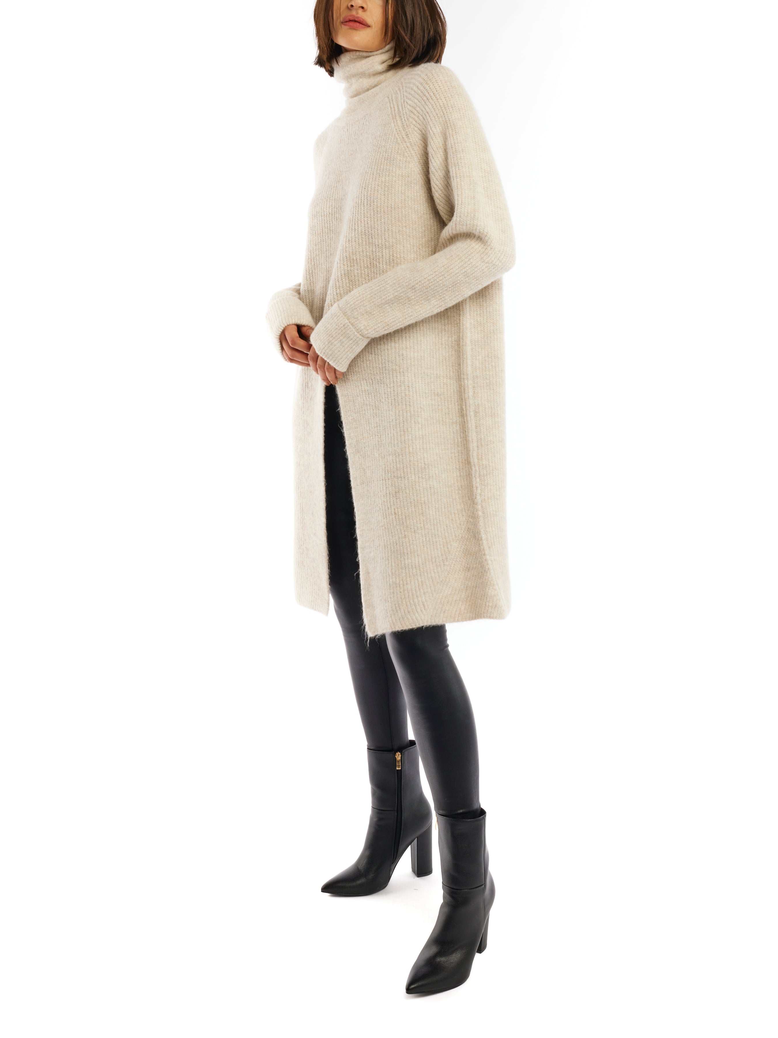 Chic turtleneck, cruelty-free knit sweater with long sleeves and slit front - side shot