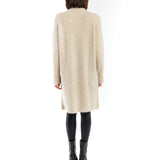 Chic turtleneck, cruelty-free knit sweater with long sleeves and slit front - back shot