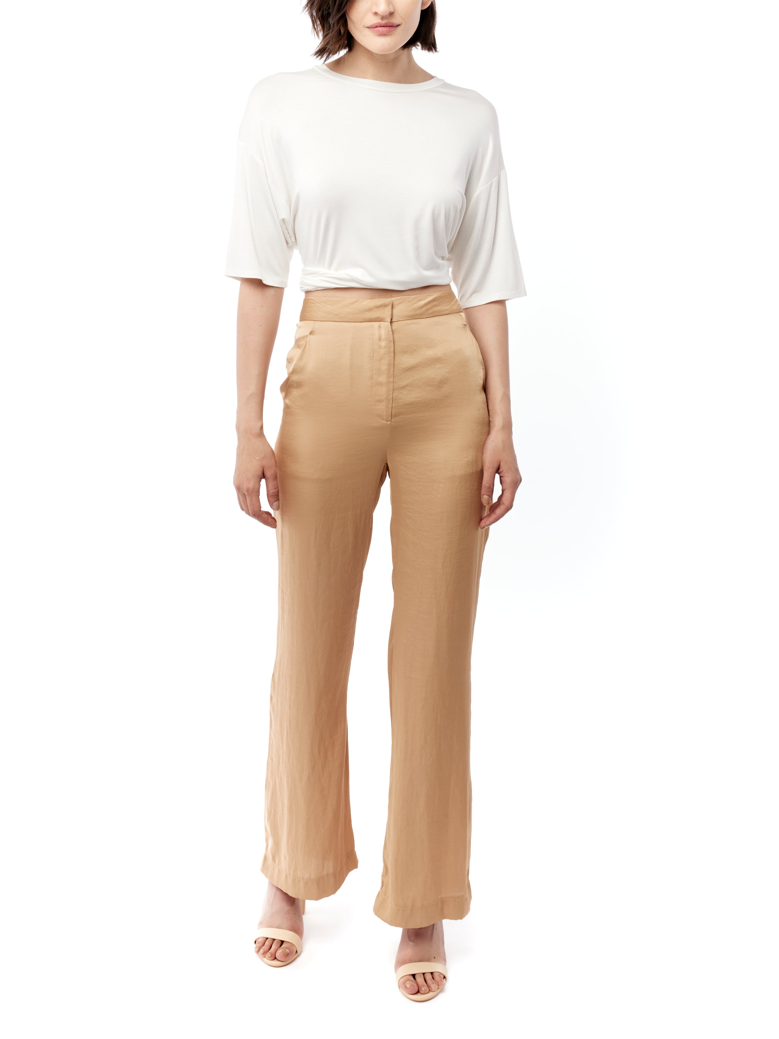 Mid-rise pant in a fluid satin featuring side pockets in honey
