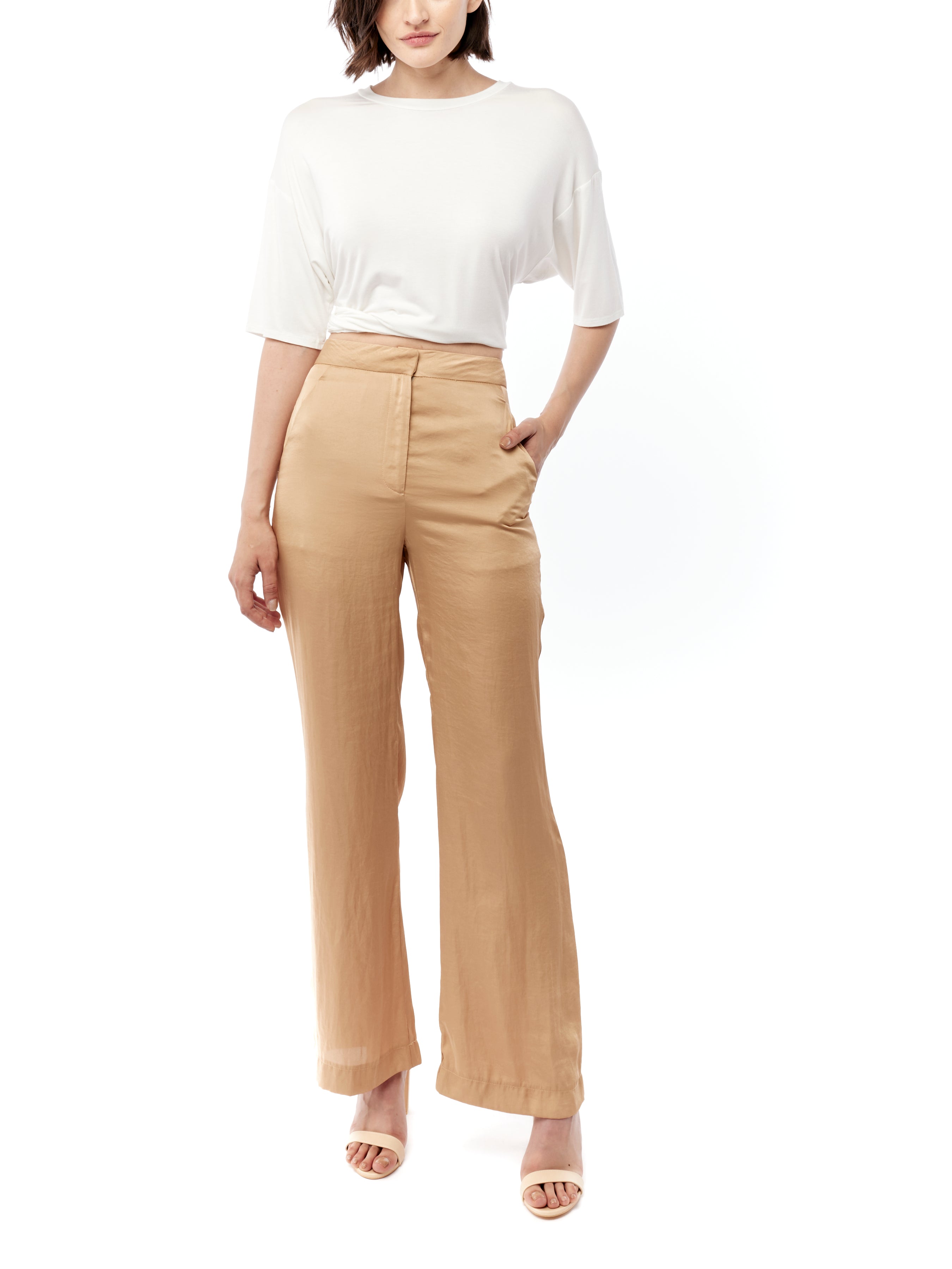 Mid-rise pant in a fluid satin featuring side pockets in honey