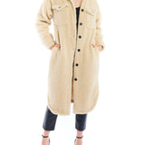 cozy jacket with shirt tail hem, midi length, two front pockets and long sleeves in cream