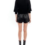 Black mid-rise shorts featuring an elasticized waist and easy, relaxed fit.