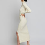 long sleeve, midi dress with a mock turtleneck, ribbed detailing, side slit and back cut out in ivory