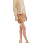 mock sweater features long sleeves and slightly cropped length in sand