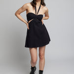 mini cutout dress with a tie neck, side cutouts and cinched front bust with covered band in black
