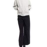 cozy, zip up jacket with elasticized cuffs and bottom hem, front pockets and a varsity collar