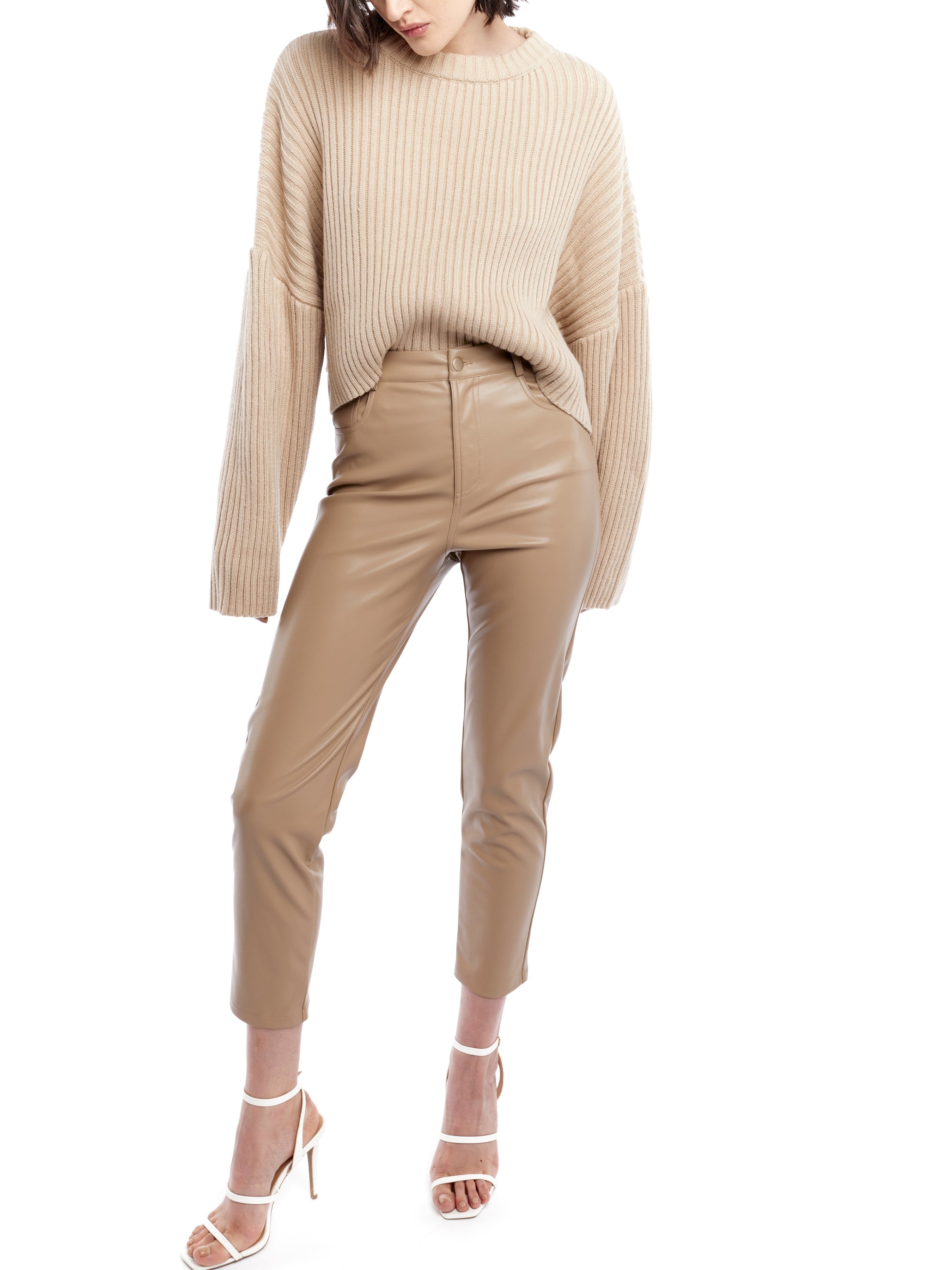 cropped faux leather pant with a mid rise, zipper and button closure and side and back pockets in taupe