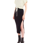 Cropped cable knit, short sleeve sweater with a drawstring, adjustable cinched waist - side view