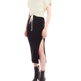 Cropped cable knit, short sleeve sweater with a drawstring, adjustable cinched waist - side view