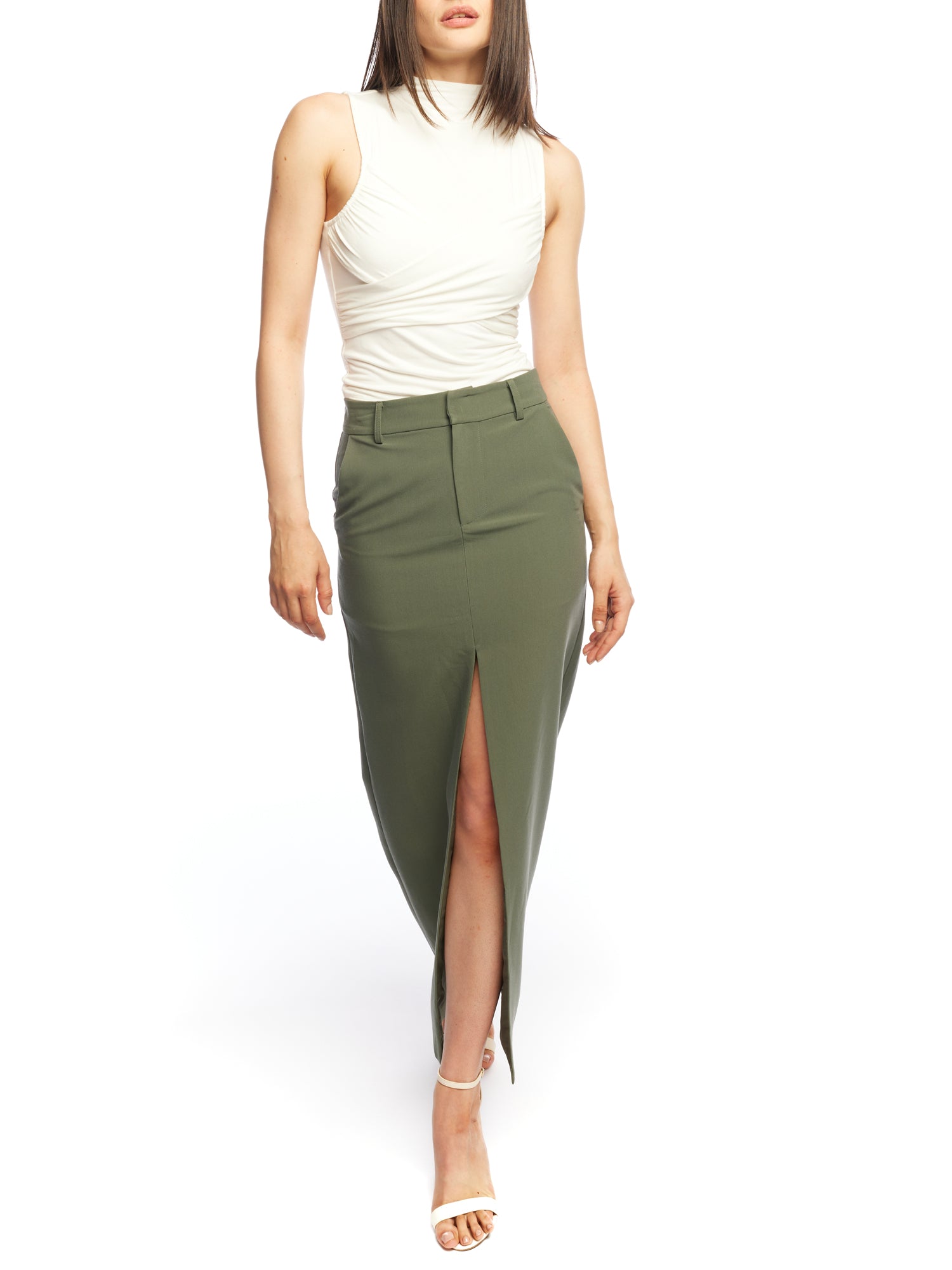 straight cut, ankle length skirt with front slit, side pockets, back welt pockets, belt loops and zipper closure