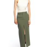 straight cut, ankle length skirt with front slit, side pockets, back welt pockets, belt loops and zipper closure