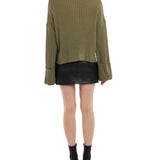 turtleneck sweater with a drop shoulder seam, large rolled cuffs, small side hem slits and a relaxed fit in olive