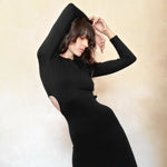 black open back dress featuring long sleeves, elegant crew neck and sexy side slit