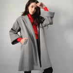 Cari oversized coat with an open front, pointed collar, large cuffs and side slits in heather grey