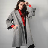 Cari oversized coat with an open front, pointed collar, large cuffs and side slits in heather grey