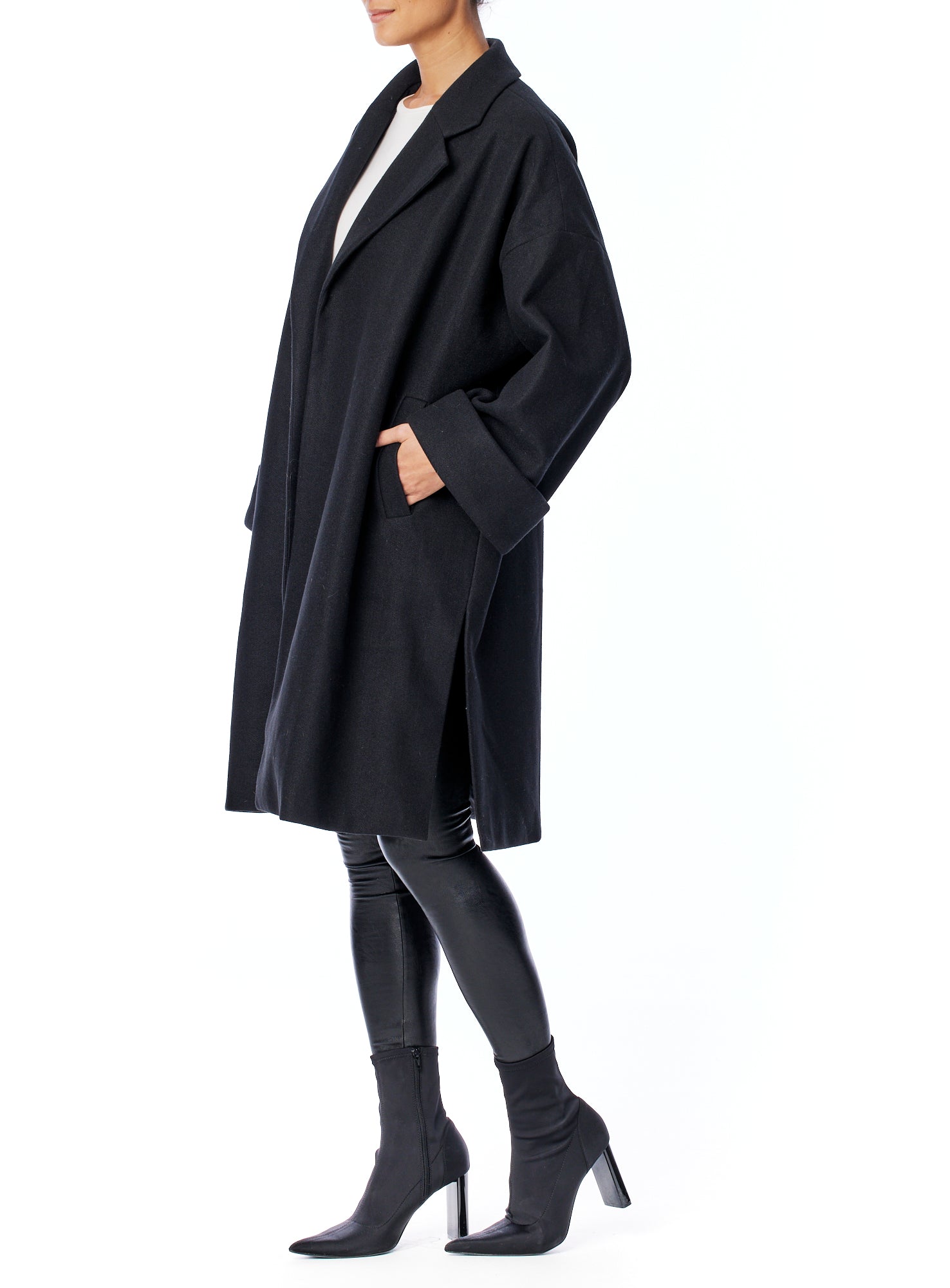 Cari faux wool oversized jacket with open front, large cuffs and side slits in black