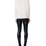 turtleneck sweater with long sleeves, relaxed fit, cross seam detailing and drop shoulder in cream