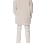 button up shacket in cuddly fabric featuring front and side pockets and shirt tail hem