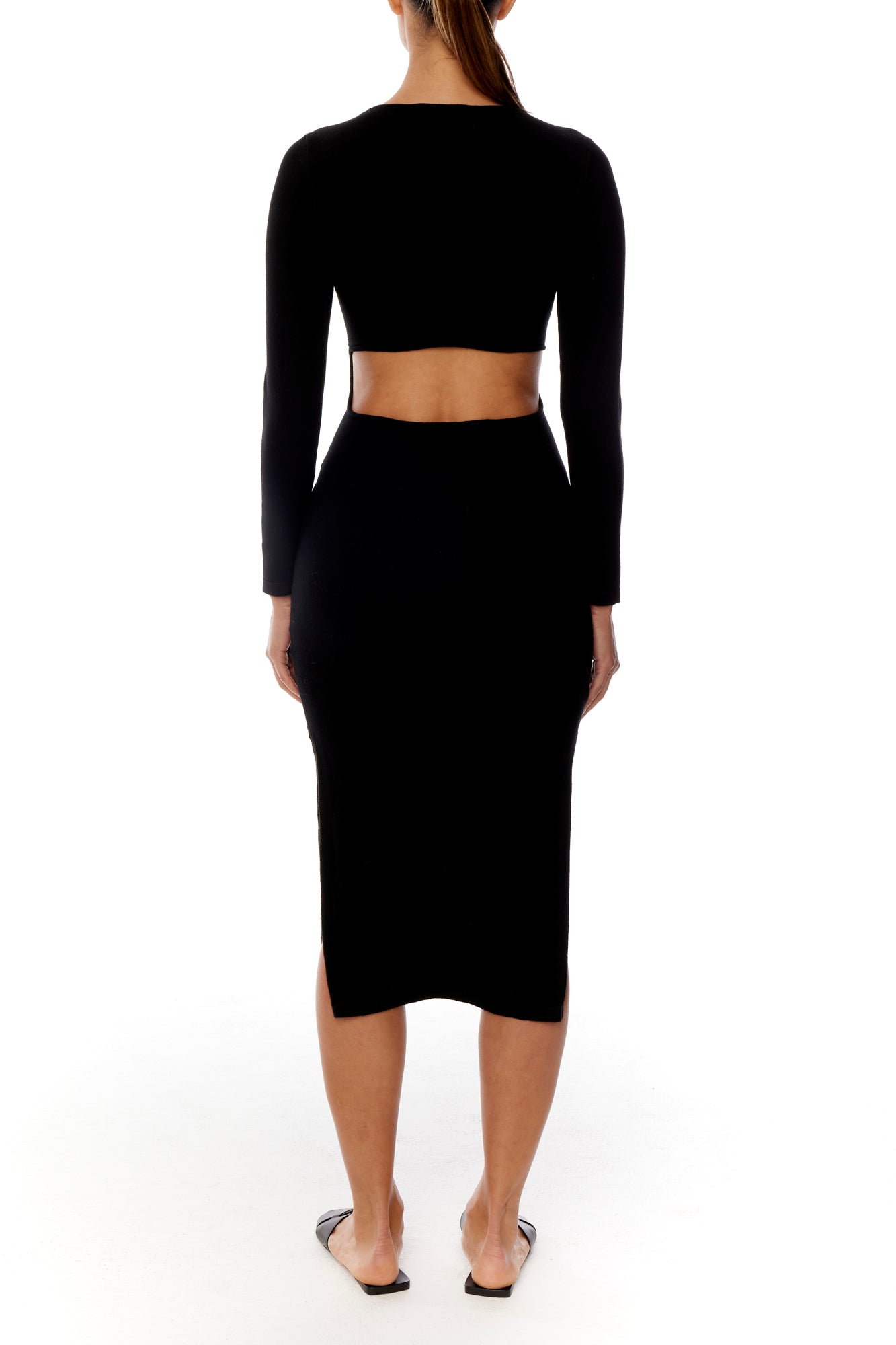 little black, open back dress featuring long sleeves, elegant crew neck and sexy side slit