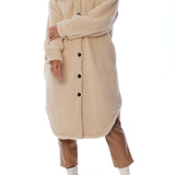 Button up cozy jacket with shirt tail hem, midi length, two front pockets and long sleeves