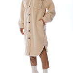 Button up cozy jacket with shirt tail hem, midi length, two front pockets and long sleeves