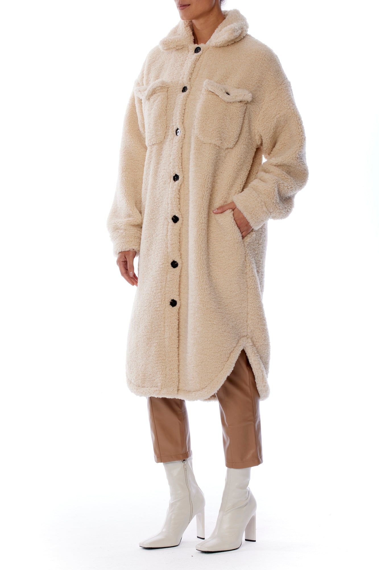 Button up cozy jacket with shirt tail hem, midi length, two front pockets and long sleeves