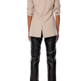 collarless blazer with a slim front lapel, 3/4 sleeve and front pockets with vegan leather trim