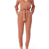 vegan silk jumpsuit with a cross over front, tapered leg, long sleeves, tie waist & side pockets